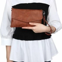 Coupon π Wimona Alessandra 5022 Kleine Schoudertas / Crossbody Tas - Cognac π 24 Coupon π Wimona Alessandra 5022 Kleine Schoudertas / Crossbody Tas - Cognac π -tassen-dames Verkoop 550x762 3